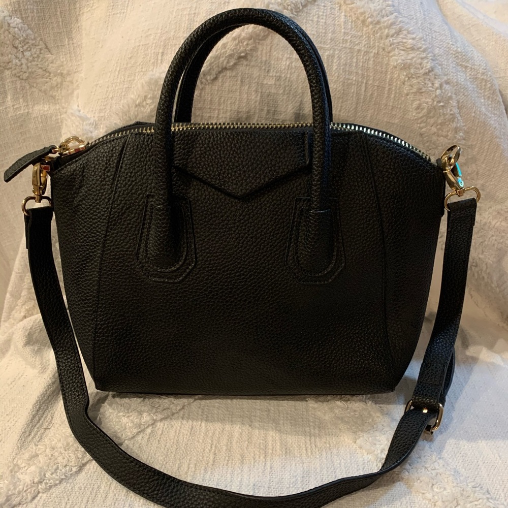 Black handbag with straps